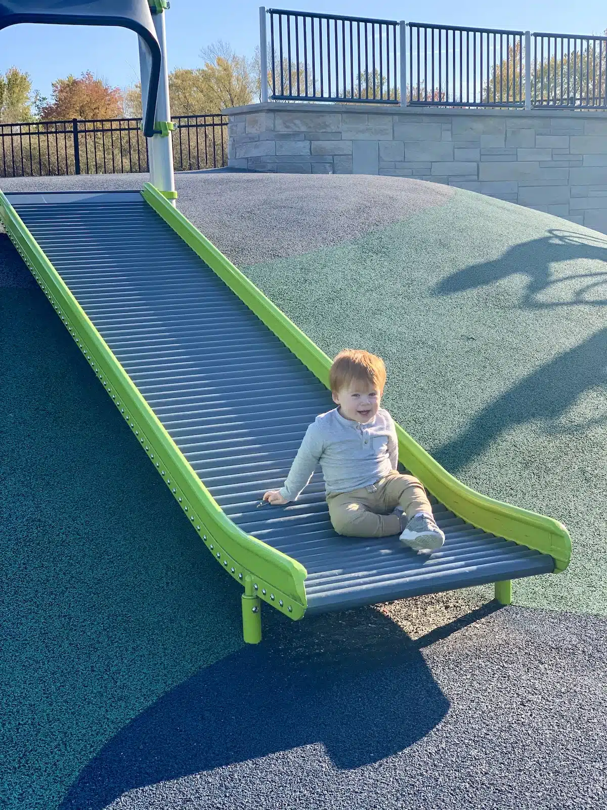 Westermeier Commons Playground in Carmel: Why Families Love It 10 Roller slide built into the hillside at Westermeier Commons Playground