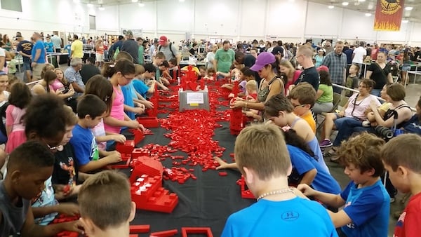 Kids building with the 20,000 LEGO bricks in a free build area. It is amazing what they create from their imaginations. (photo by Bryan Bonahoom)