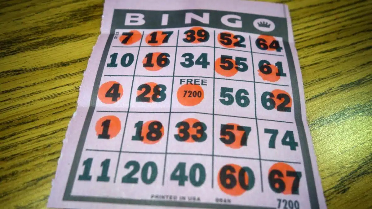 Bingo card with orange markers on the numbers