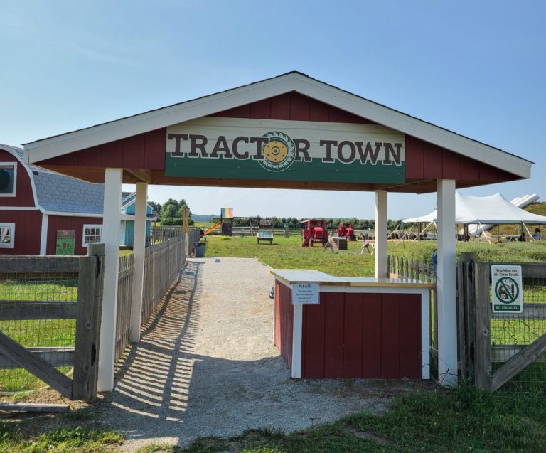 Tractor Town features slides, swings, a track for bikes, and many other play options sure to entertain the younger guests.