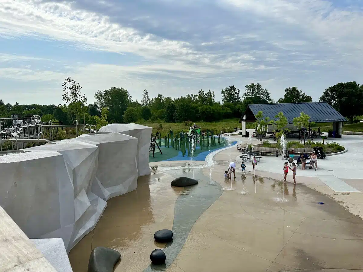 West Park in Carmel: A Year-Round Playground, Splash Pad and Sledding Destination 11 Splash pad with rock wall waterfalls at West Park in Carmel