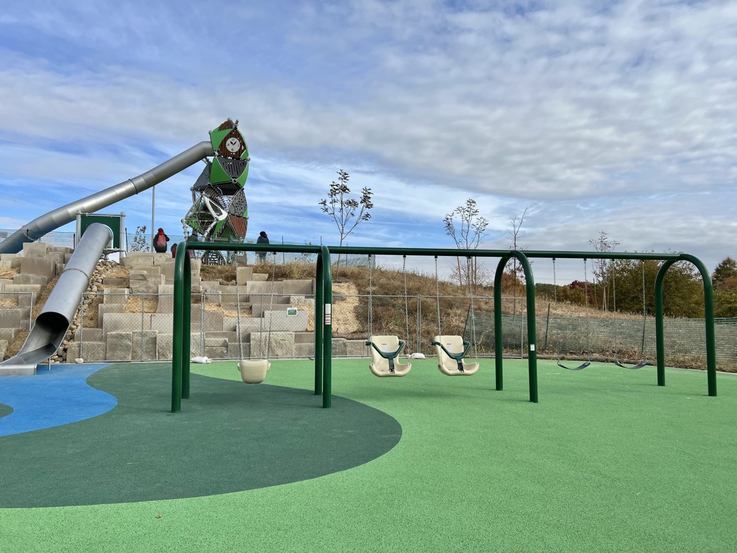 West Park in Carmel: A Year-Round Playground, Splash Pad and Sledding Destination 15 Aerial shot of swings, clock tower and rock wall at West Park in Carmel