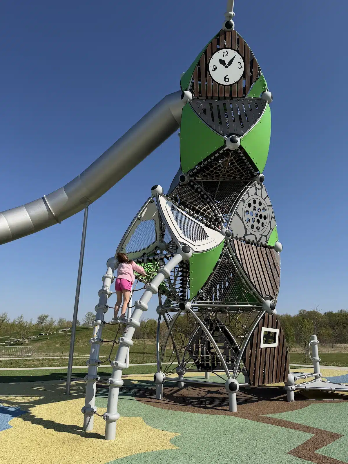 West Park in Carmel: A Year-Round Playground, Splash Pad and Sledding Destination 7 Clock tower climbing net play structure at West Park in Carmel