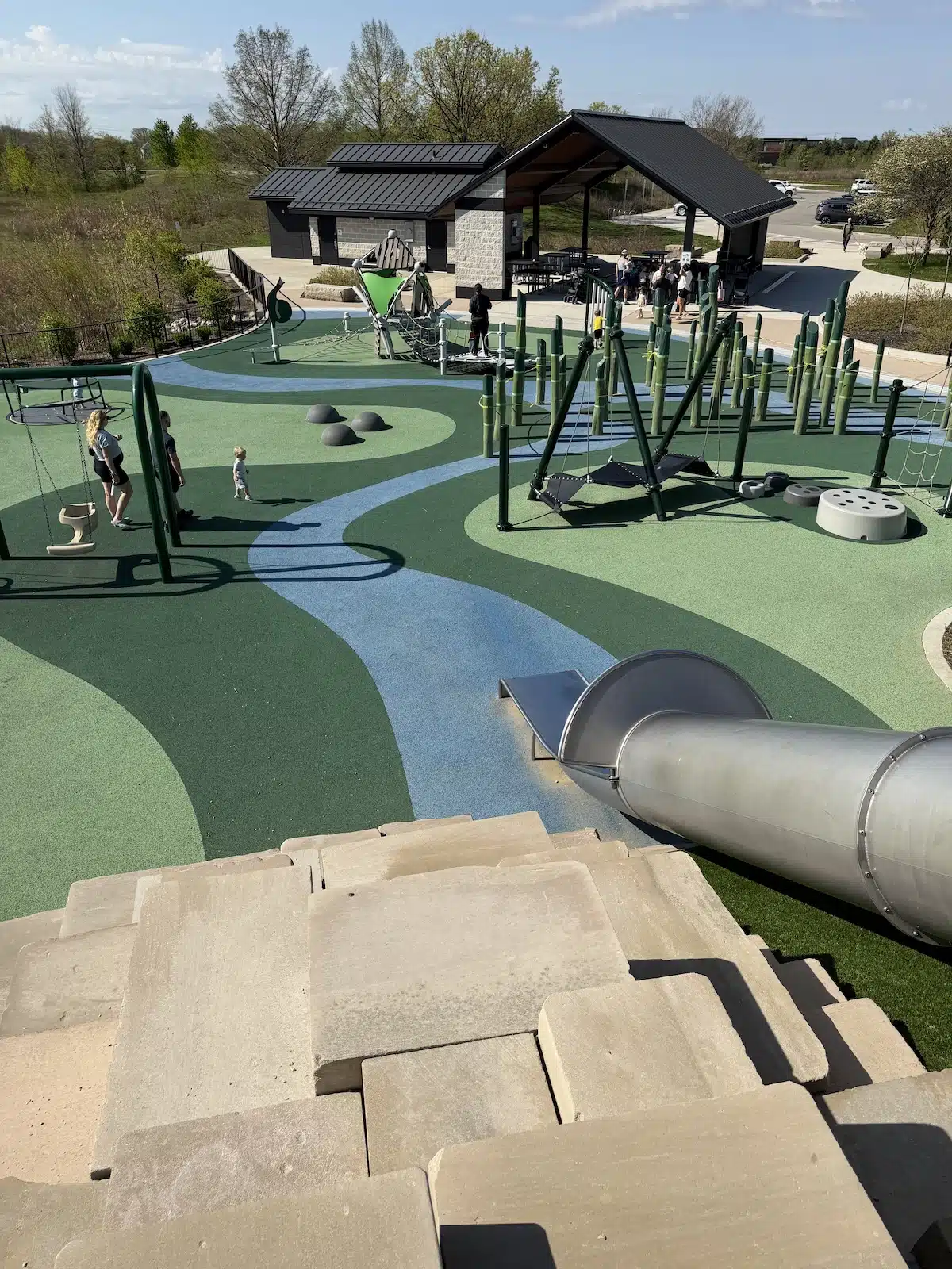 West Park in Carmel: A Year-Round Playground, Splash Pad and Sledding Destination 6 Top view of the stone block climbing wall at West Park playground in Carmel