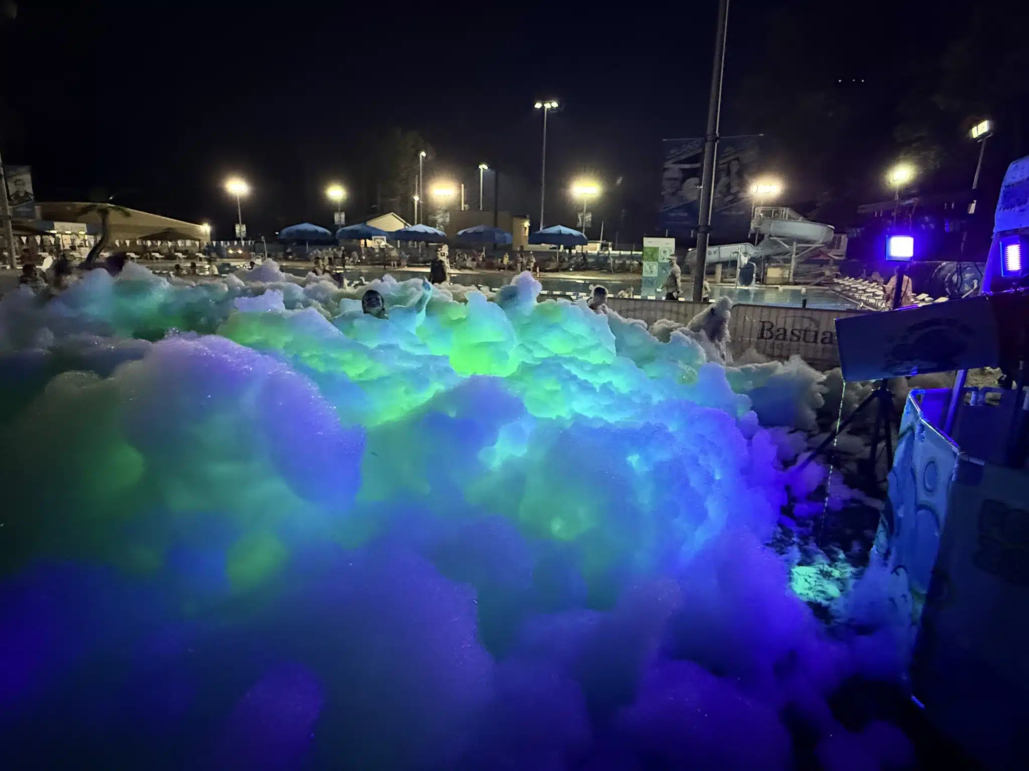 Kids enjoying foam during the Summer Bash Foam Party at Forest Park Aquatic Center