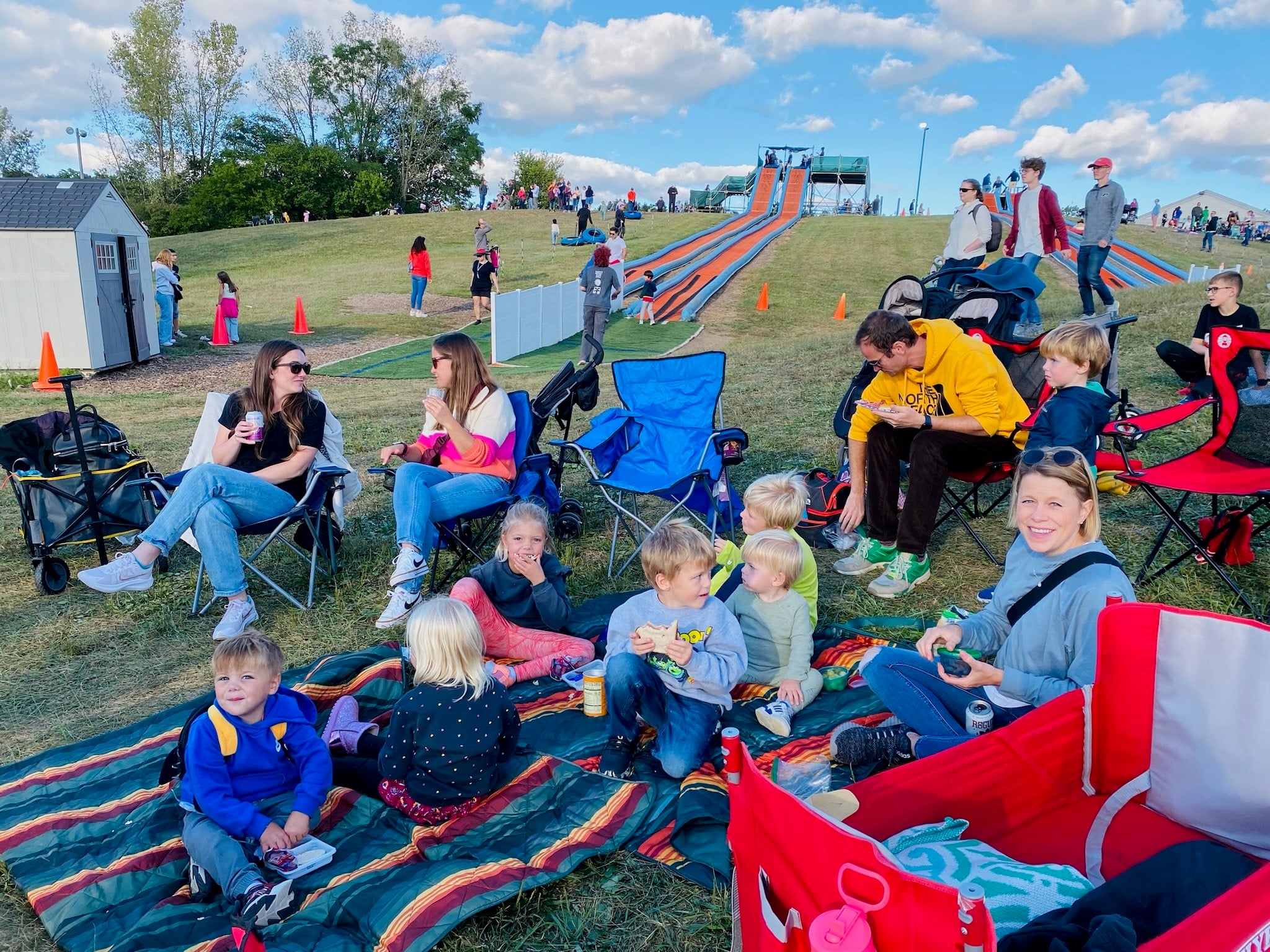 Jupiter Flights Balloon Festival Returns to Conner Prairie 2026 2 Families watching hot air balloons inflate during Jupiter Flights at Conner Prairie