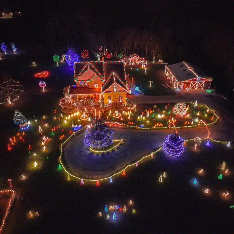 Payton “Griswold” Bohler’s Christmas Acres house glowing with synchronized lights in Franklin, Indiana