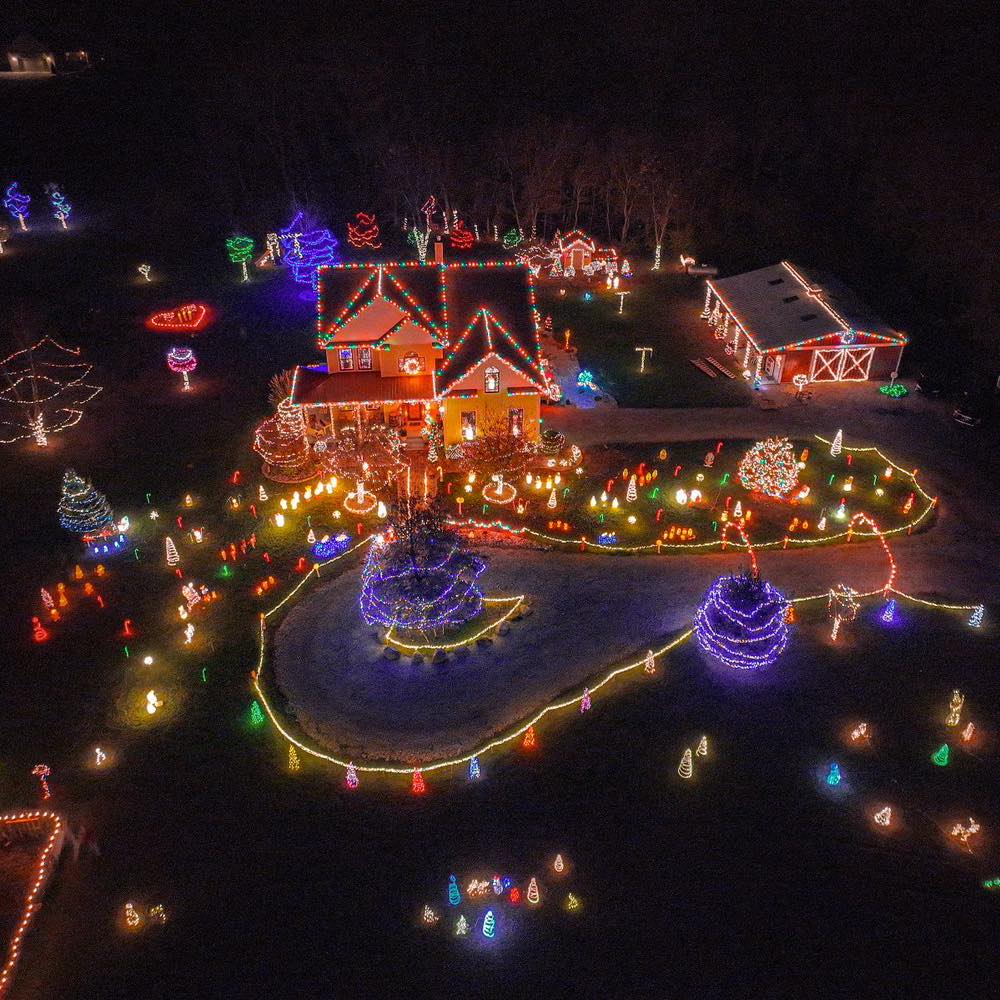 Payton “Griswold” Bohler’s Christmas Acres house glowing with synchronized lights in Franklin, Indiana
