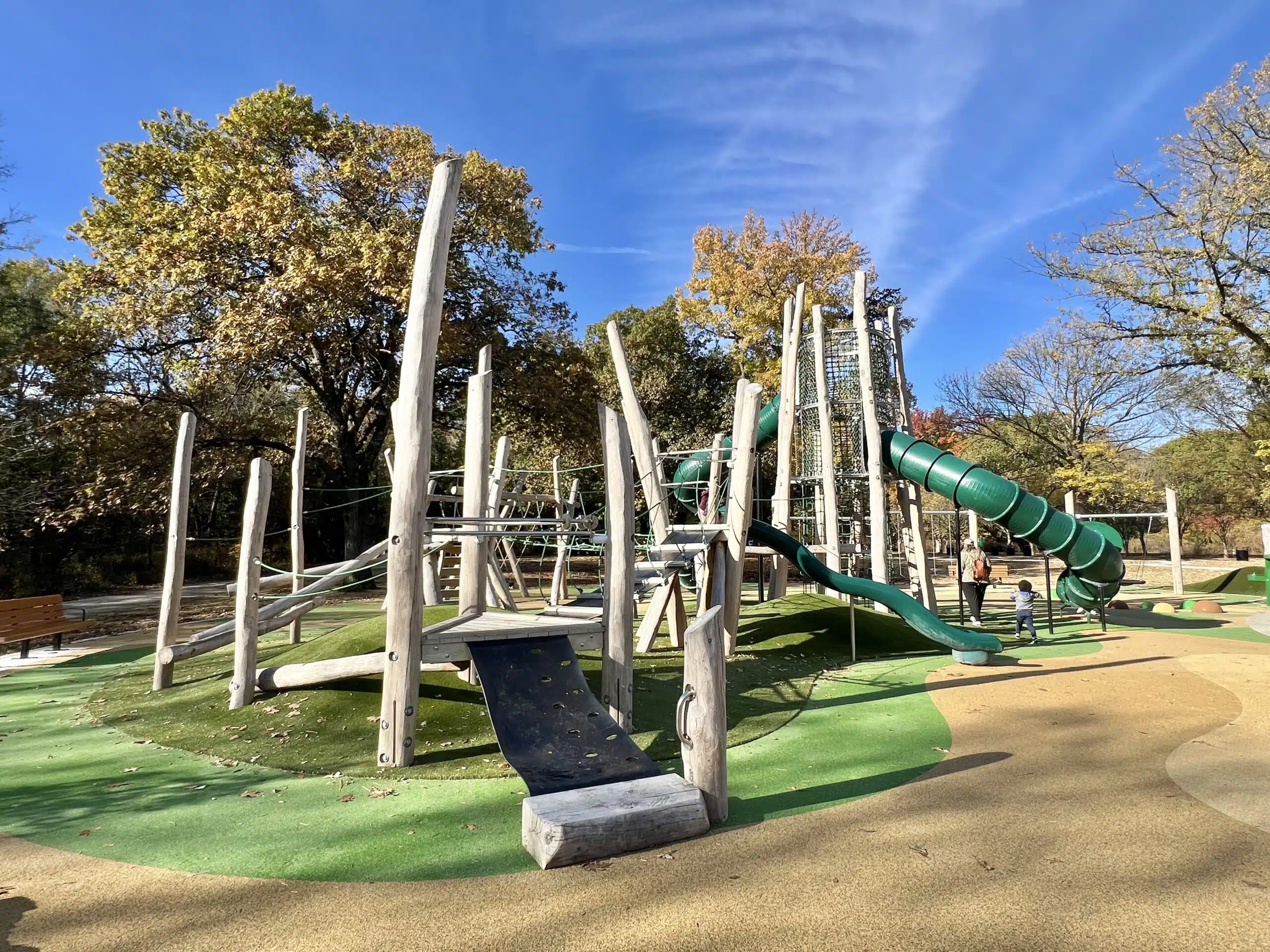 15 Worth-the-Drive Playgrounds in Indiana for Families 2 Nature-themed climbing and play structures at Holliday Park playground in Indianapolis, Indiana