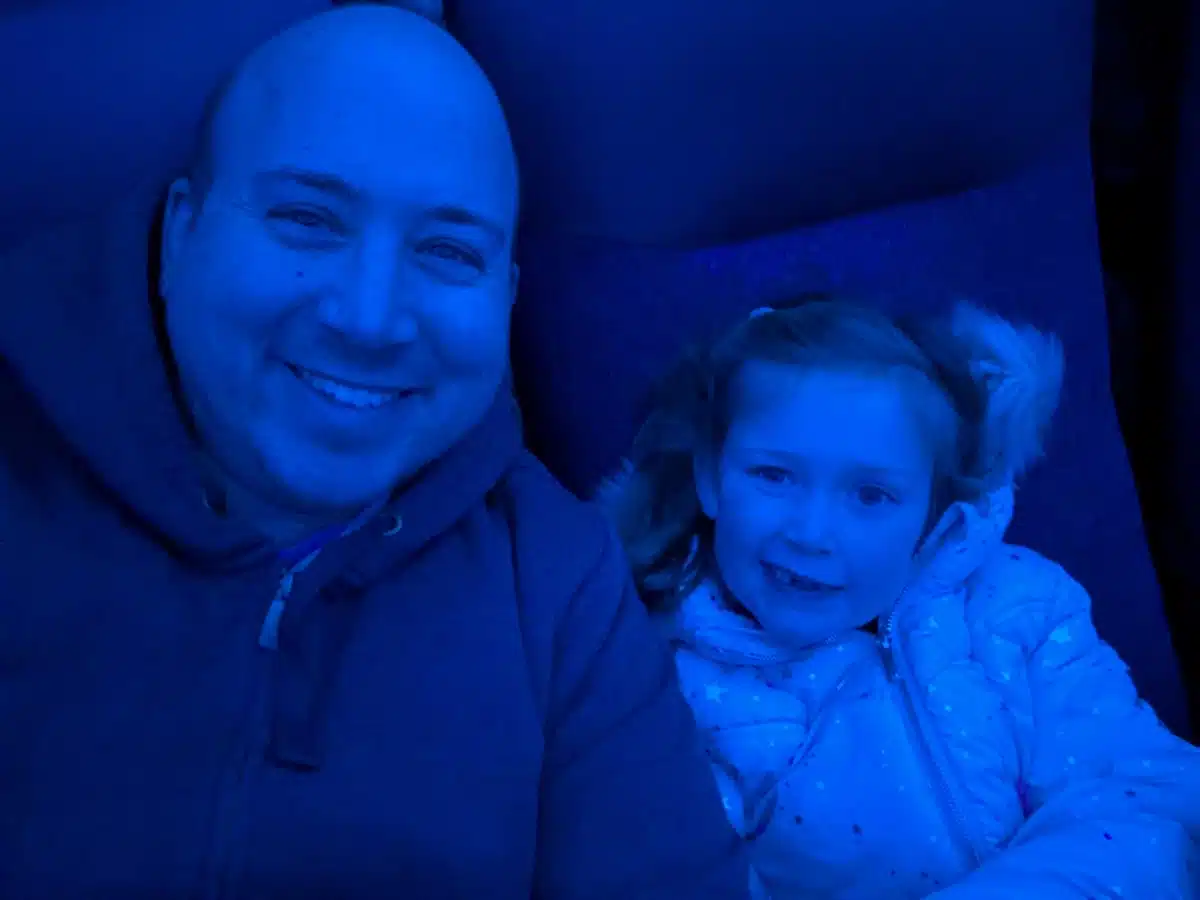 Dad and daughter inside Holcomb Observatory & Planetarium at Butler University before the planetarium show