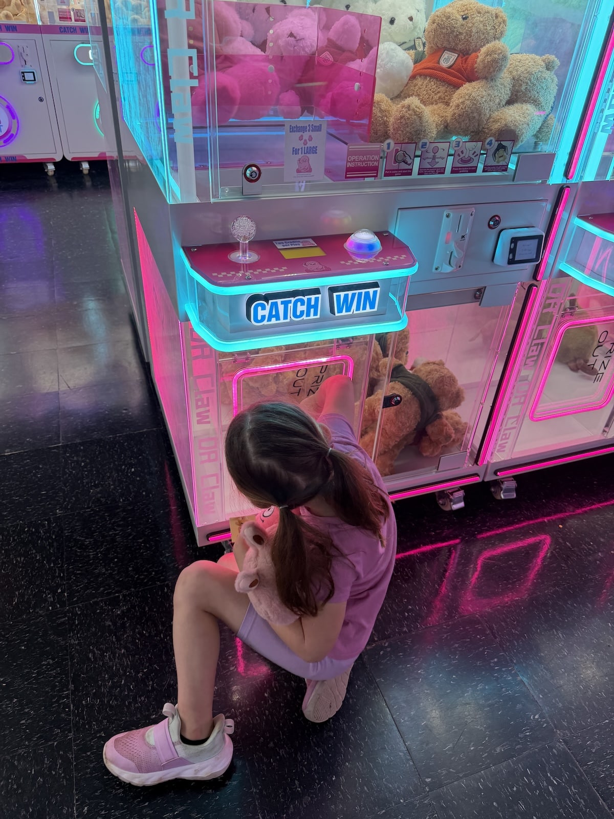 We Tried the All-Claw-Machine Arcade in Indianapolis. Here's What Happened. Getting toy out of machine