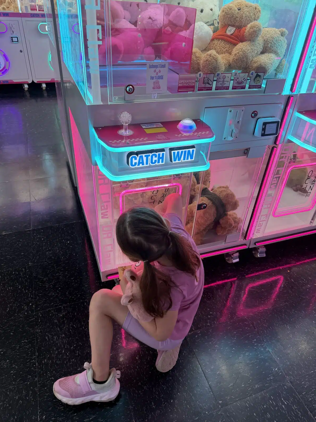 We Tried the All-Claw-Machine Arcade in Indianapolis. Here's What Happened. Getting toy out of machine