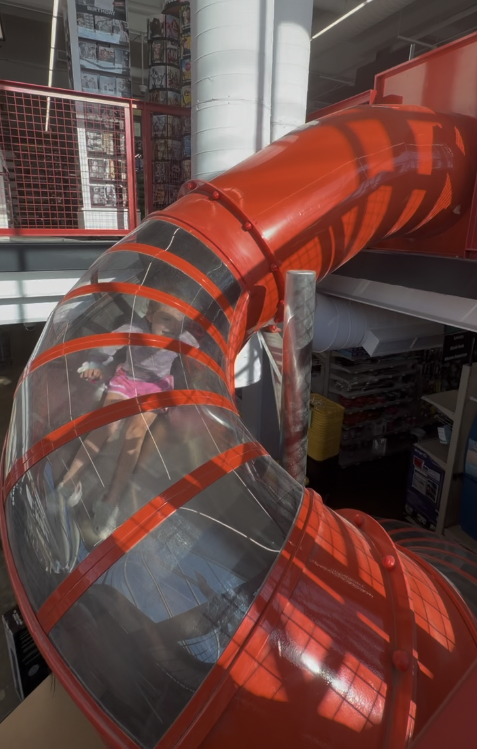 Ace Hardware With a Slide Inside in Indianapolis 5 Child inside the indoor slide at Benge's Ace Hardware near Tarkington Park
