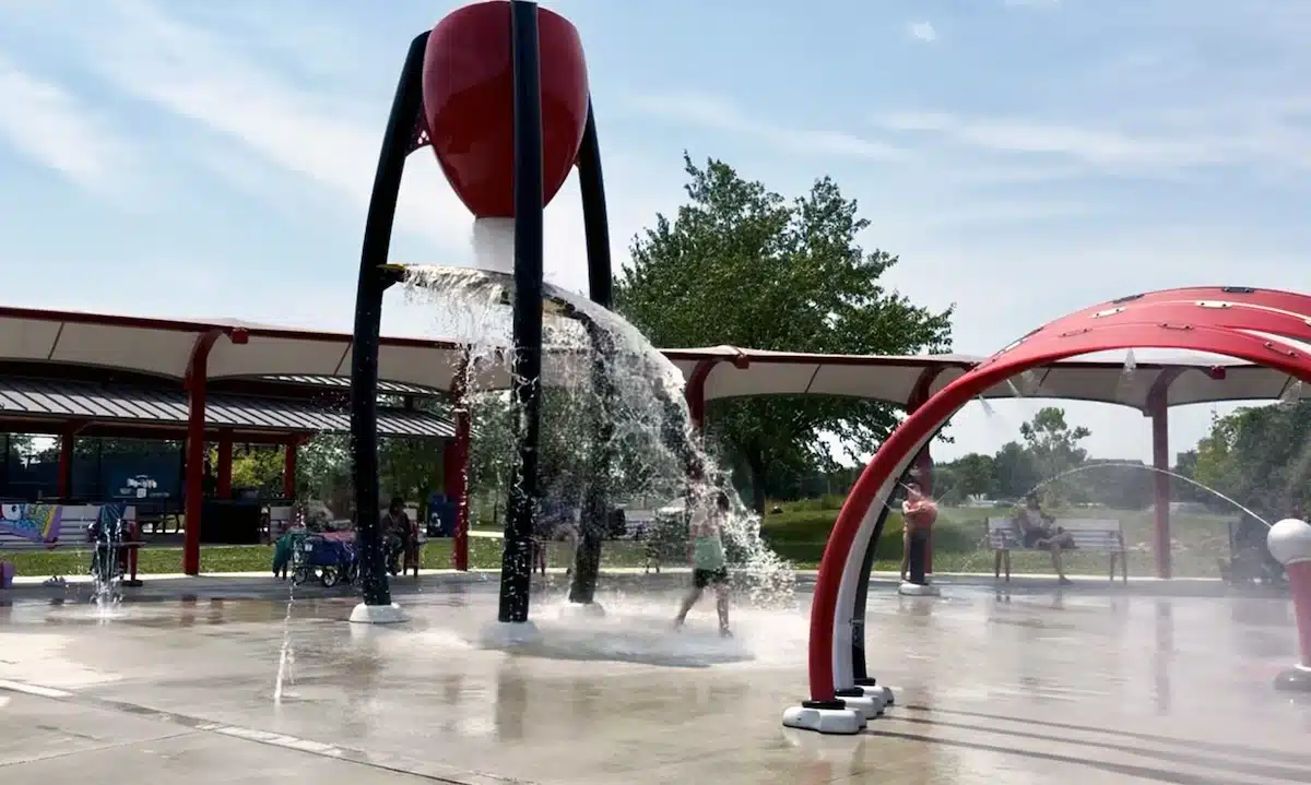 Lawrence W. Inlow Park Splash Pad in Carmel 3 Water dumping out of bucket onto kids Lawrence W. Inlow Park in Carmel Splash Pad