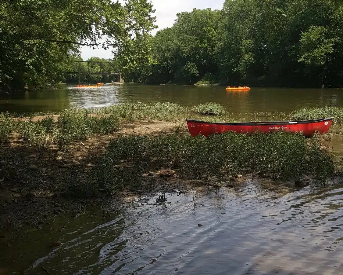 Canoes and kayaks ready for a White River float trip in Noblesville