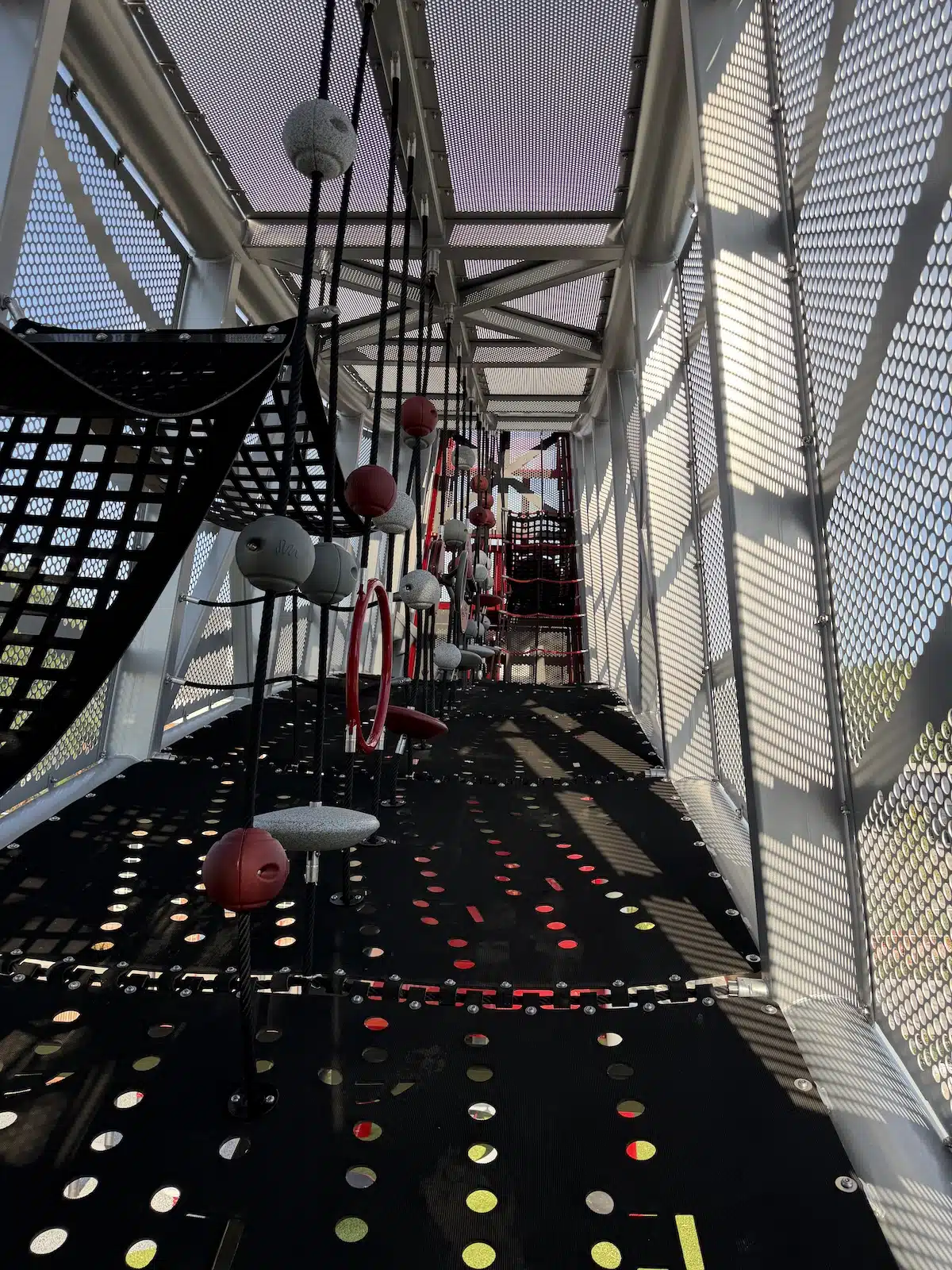 Carmel’s Huge New Monon Boulevard Playground 4 Climbing obstacles inside the bridge at Up and Down the Monon playground