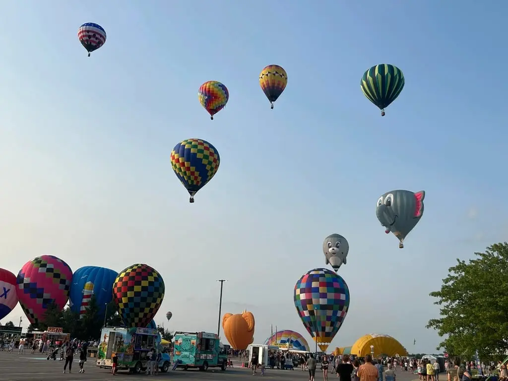 Hot air balloons flying over Angola during Angola Balloons Aloft