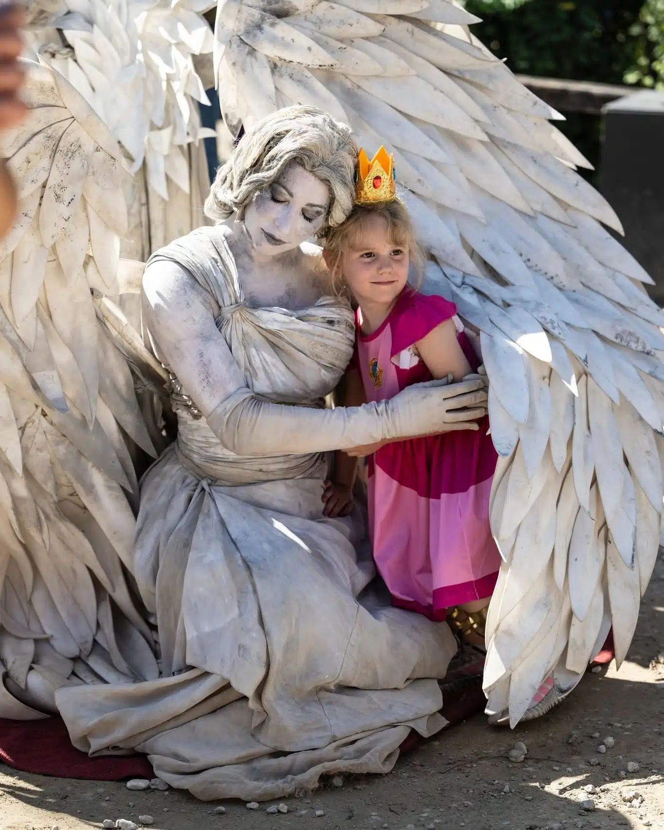 Ohio Renaissance Festival: A Day Trip From Indy With Kids 6 Child meeting a fairy character at the Ohio Renaissance Festival