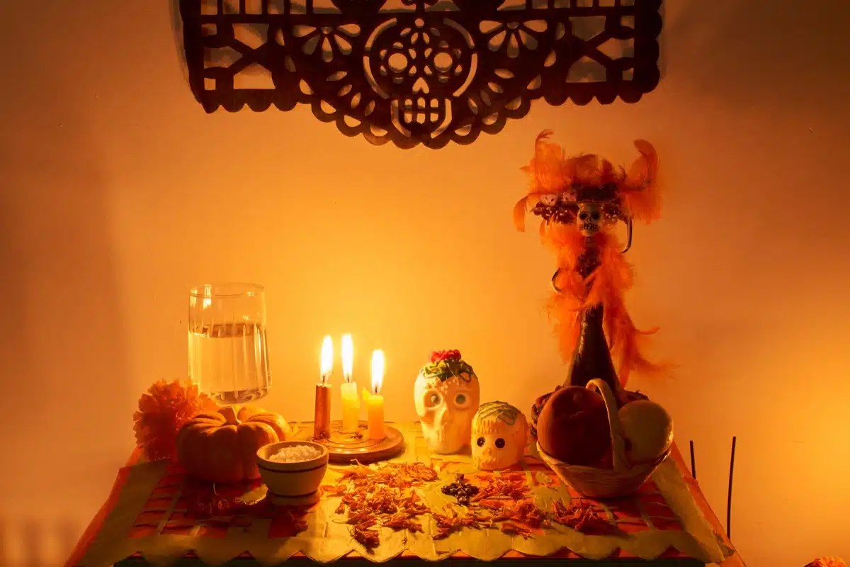 Celebrate Día de los Muertos at the Eiteljorg on Oct. 24 1 A Día de los Muertos ofrenda with candles, sugar skulls, marigolds and papel picado