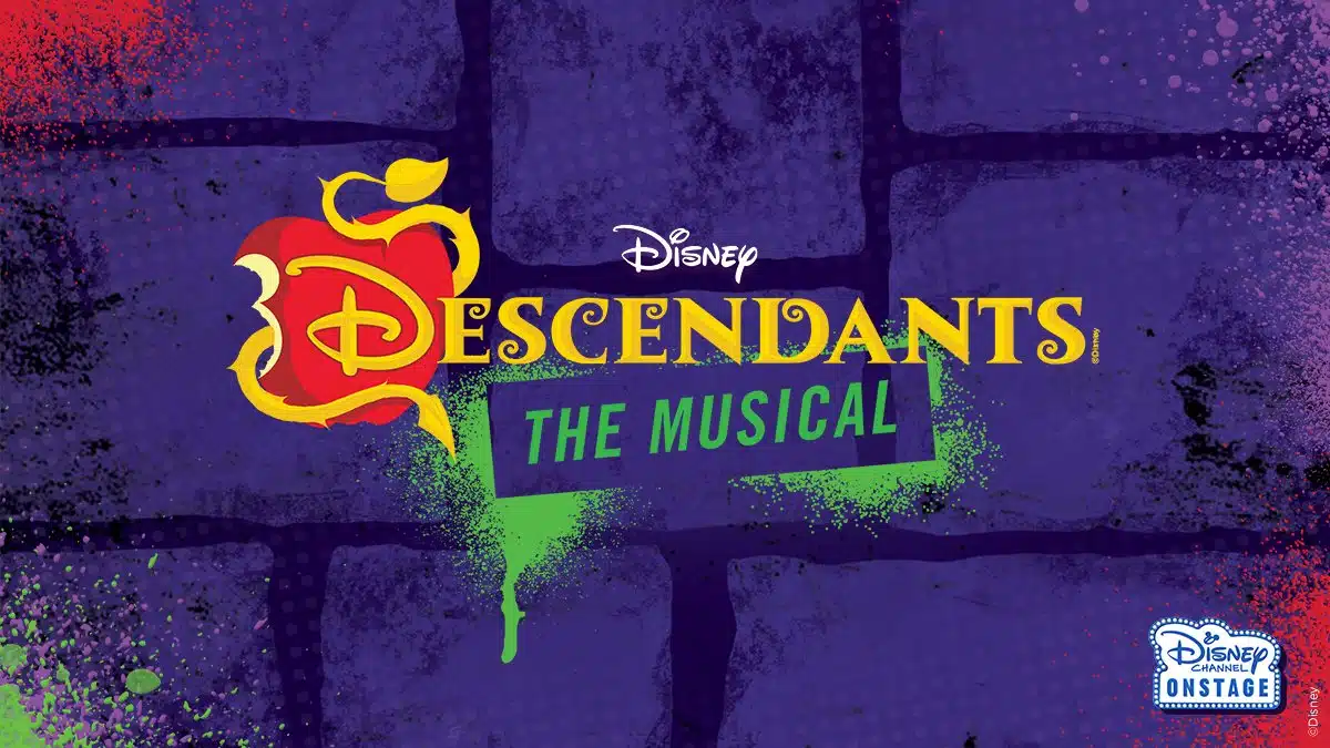 Show art for Disney's Descendants The Musical at Pike High School, with the red and gold Descendants logo on a purple brick wall