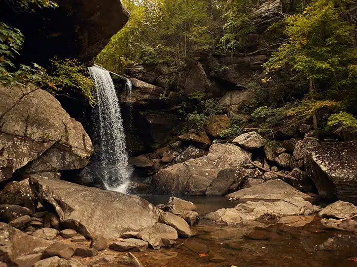 Cumberland Falls Moonbow: What It Is and Why It's Worth the Drive 4 Eagle Falls pours over a rock ledge into a pool surrounded by boulders and forest