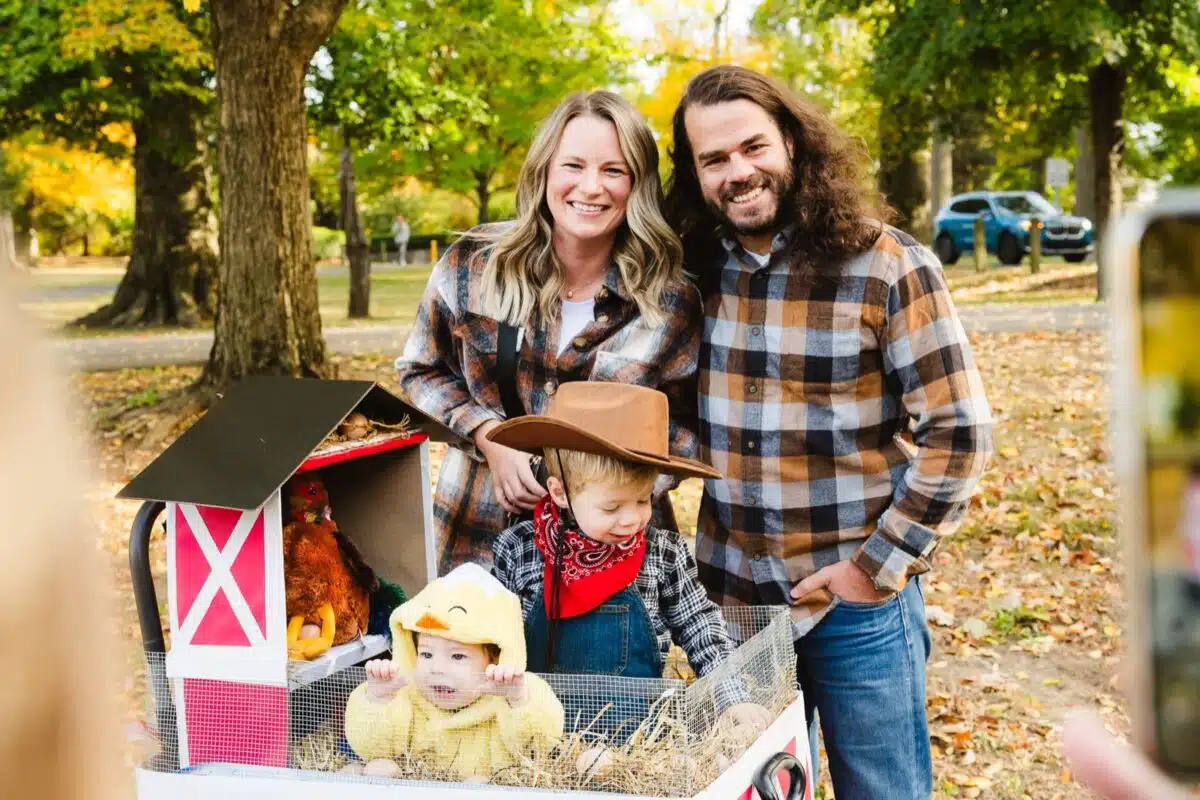 A family in costume with a decorated wagon at Halloween at Forest Park in Noblesville